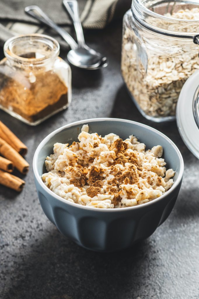 Bowl of oatmeal porridge with cinnamon.