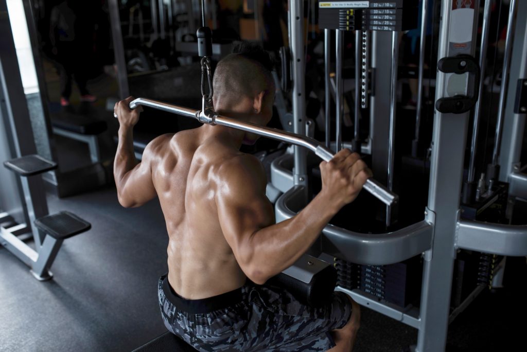 Exercising on pull down machine