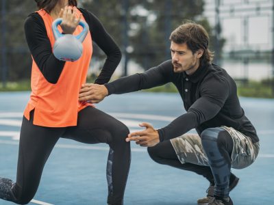 Kettlebell Strength Training with Personal Trainer Outdoors