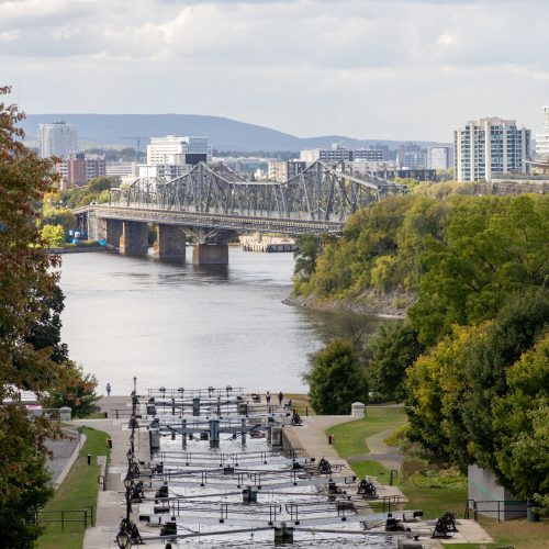 Rideau canal locks in Ottawa, Canada. View on Ottawa river, bridge and Gatineau city of Quebec